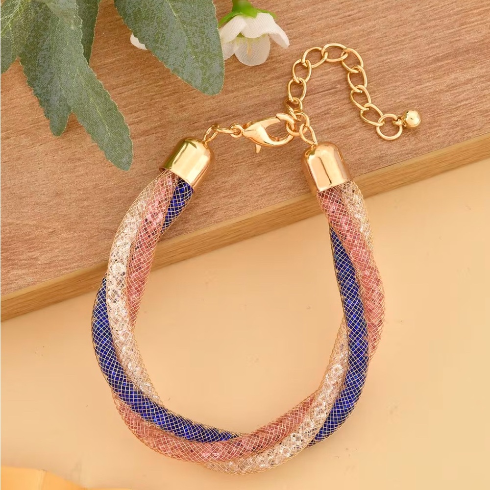 Multi Color Australian Crystal Twisted Triple Row Bracelet in Goldtone